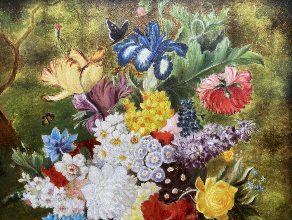 A framed oil painting featuring a floral bouquet in an urn set upon a ledge next to a bird nest. View IV