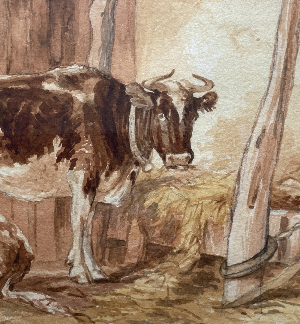 A sepia watercolour painting depicting two cows inside a timber barn, housed within a layered card mount and a burr wood frame. View VIII