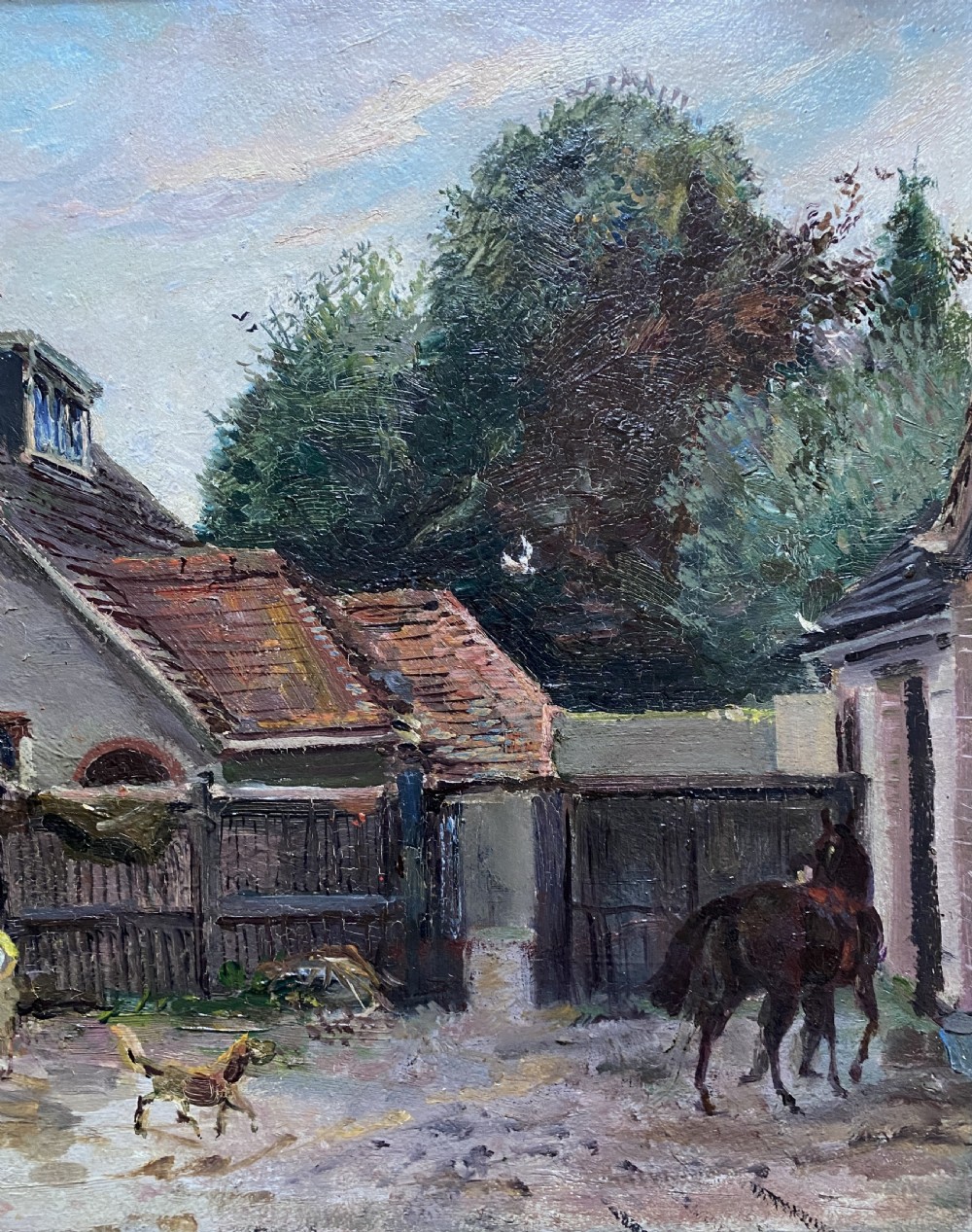 An early twentieth-century oil painting depicting a country house courtyard with figures, a dog, and a horse, set within an ornate gilt swept frame. View IV