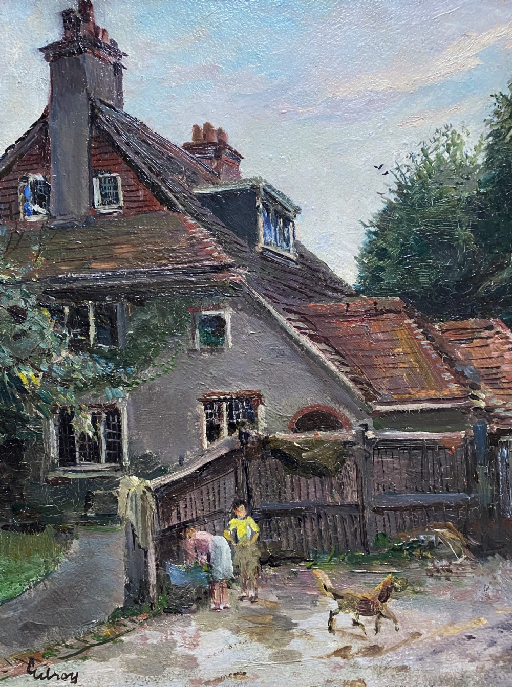 An early twentieth-century oil painting depicting a country house courtyard with figures, a dog, and a horse, set within an ornate gilt swept frame. View VI