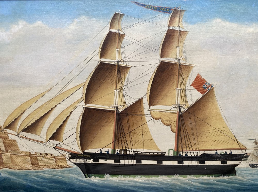 An early 19th-century marine oil painting depicting a two-masted brig ship sailing into Malta harbour, set within a black and gilt wooden frame. View III