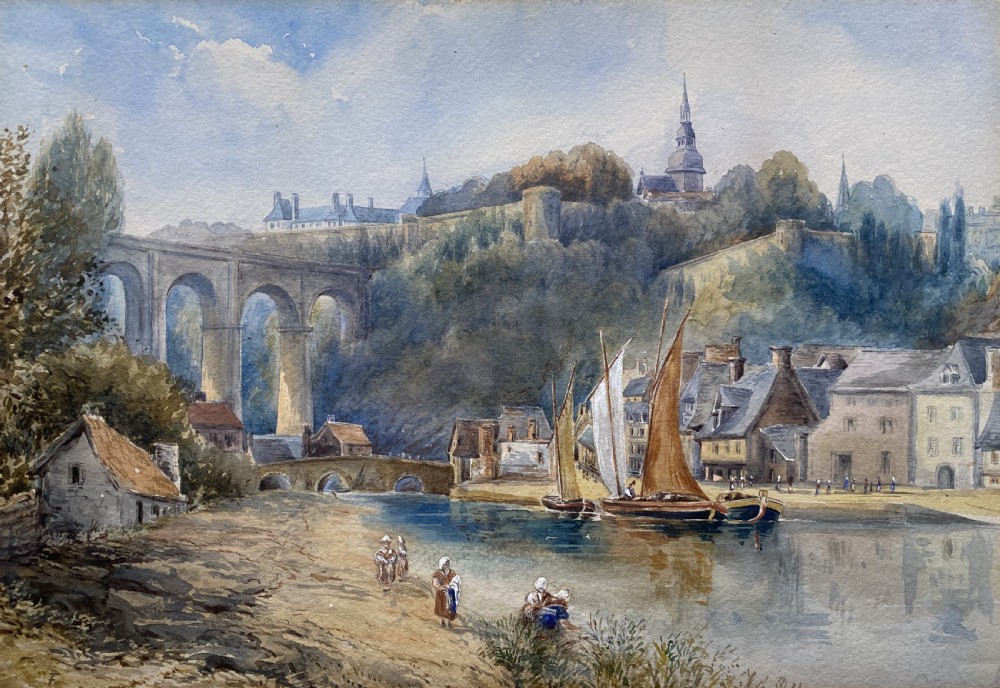 A framed 19th-century watercolour painting depicting a river scene with boats, a stone viaduct, and a hillside town set within an ornate gilded frame. View II