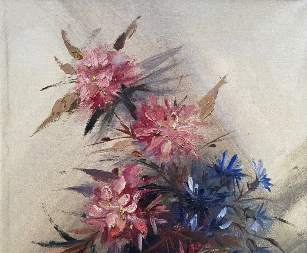 A mid-century oil painting on canvas depicting pink and blue flowers in a glass vase, displayed inside an ornate gold gilded frame. View III