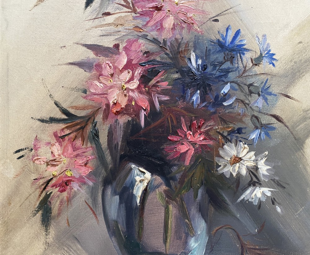 A mid-century oil painting on canvas depicting pink and blue flowers in a glass vase, displayed inside an ornate gold gilded frame. View IV