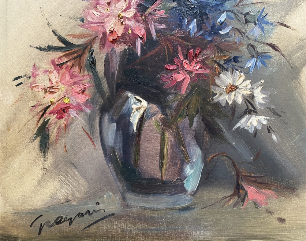 A mid-century oil painting on canvas depicting pink and blue flowers in a glass vase, displayed inside an ornate gold gilded frame. View V