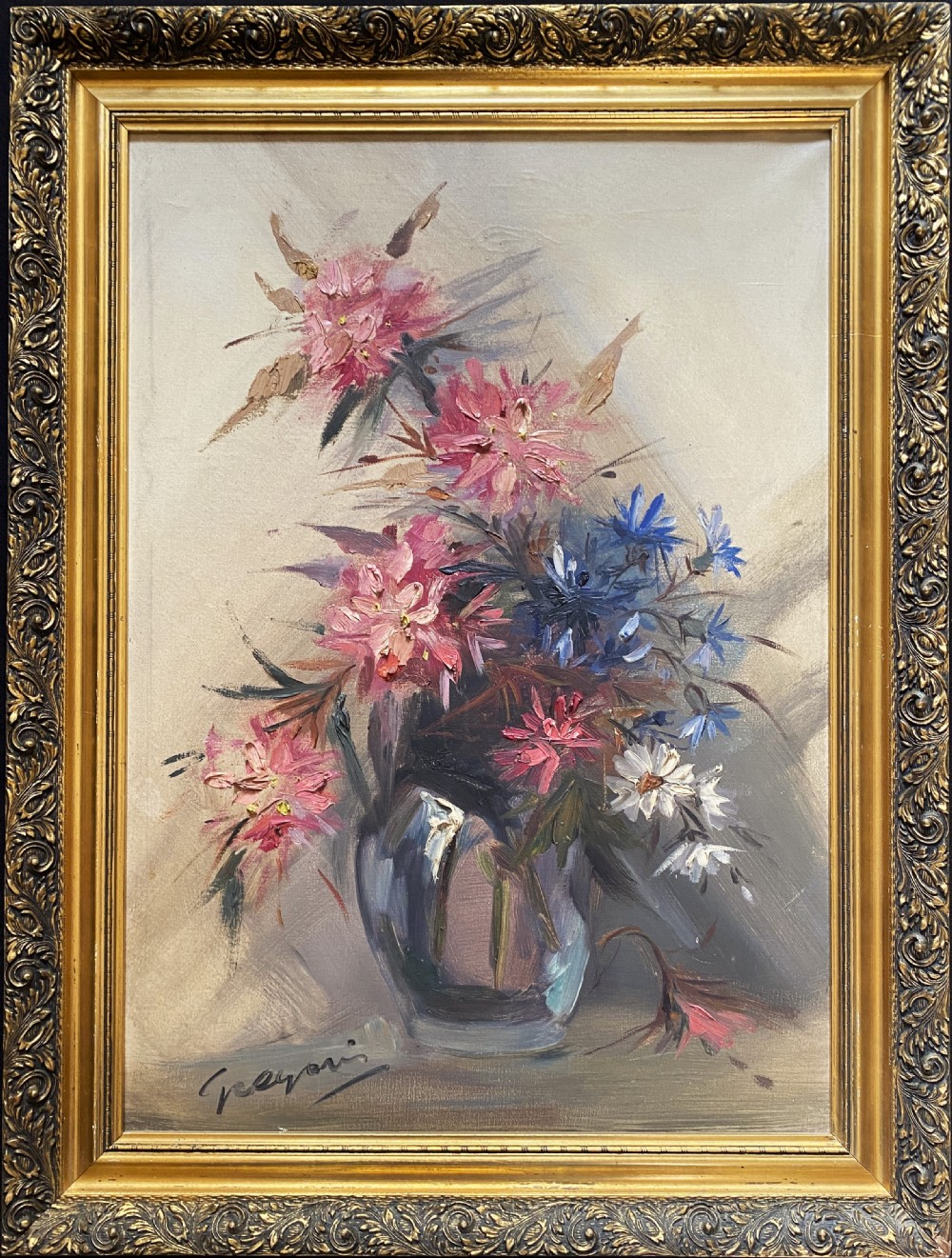 A mid-century oil painting on canvas depicting pink and blue flowers in a glass vase, displayed inside an ornate gold gilded frame. View XII