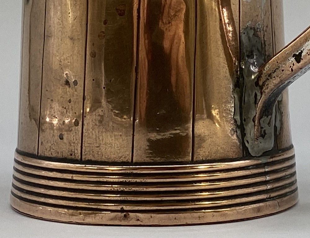 A tapered late Georgian copper tankard featuring horizontal reeded bands, vertical staved lines, and a curved nickel-plated handle. View XIII