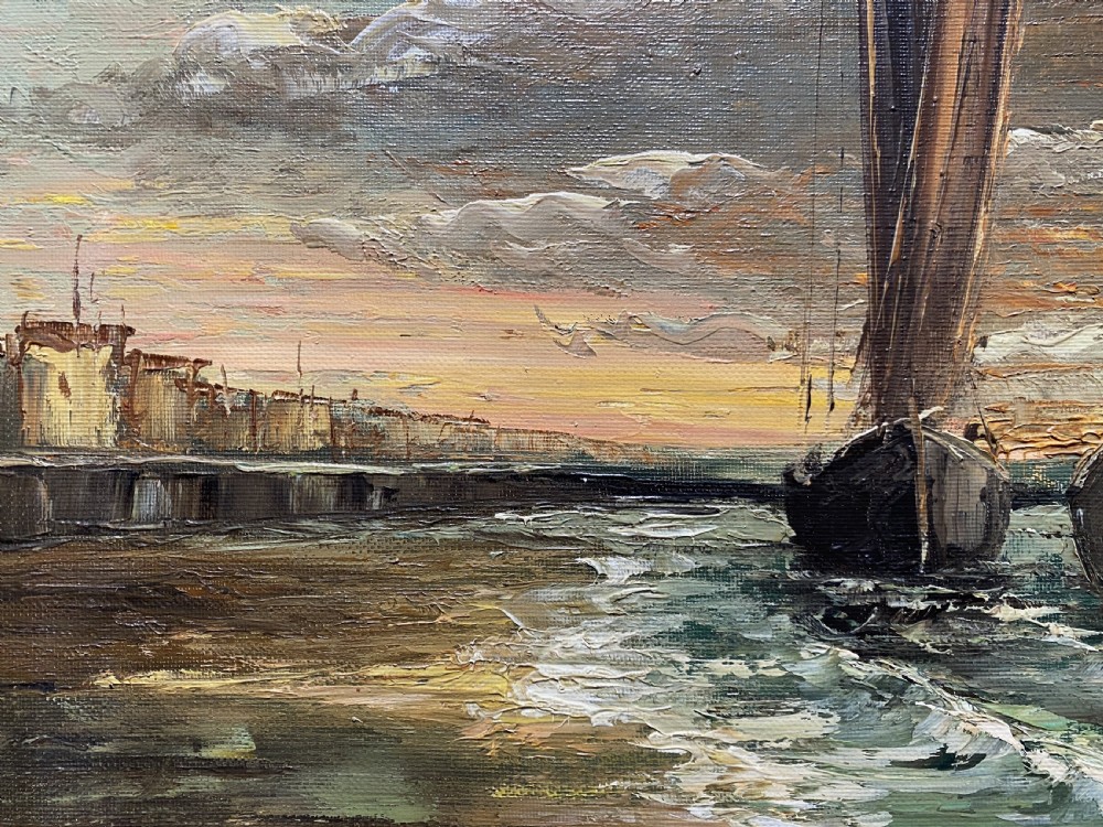 An impressionist oil painting depicting two sailing boats near a shoreline under a dramatic cloudy sky, presented in an ornate gilt frame. View VII