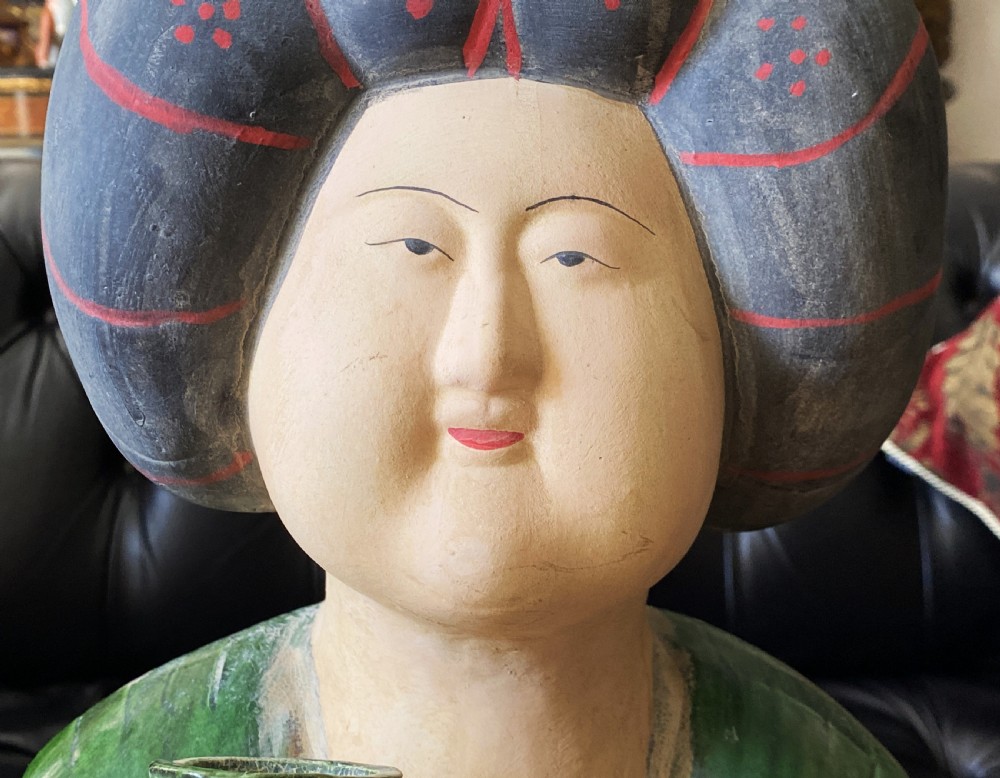 A pair of large Sancai glazed ceramic sculptures depicting Tang Dynasty style female court musicians in orange, green, and cream robes. View XVIII