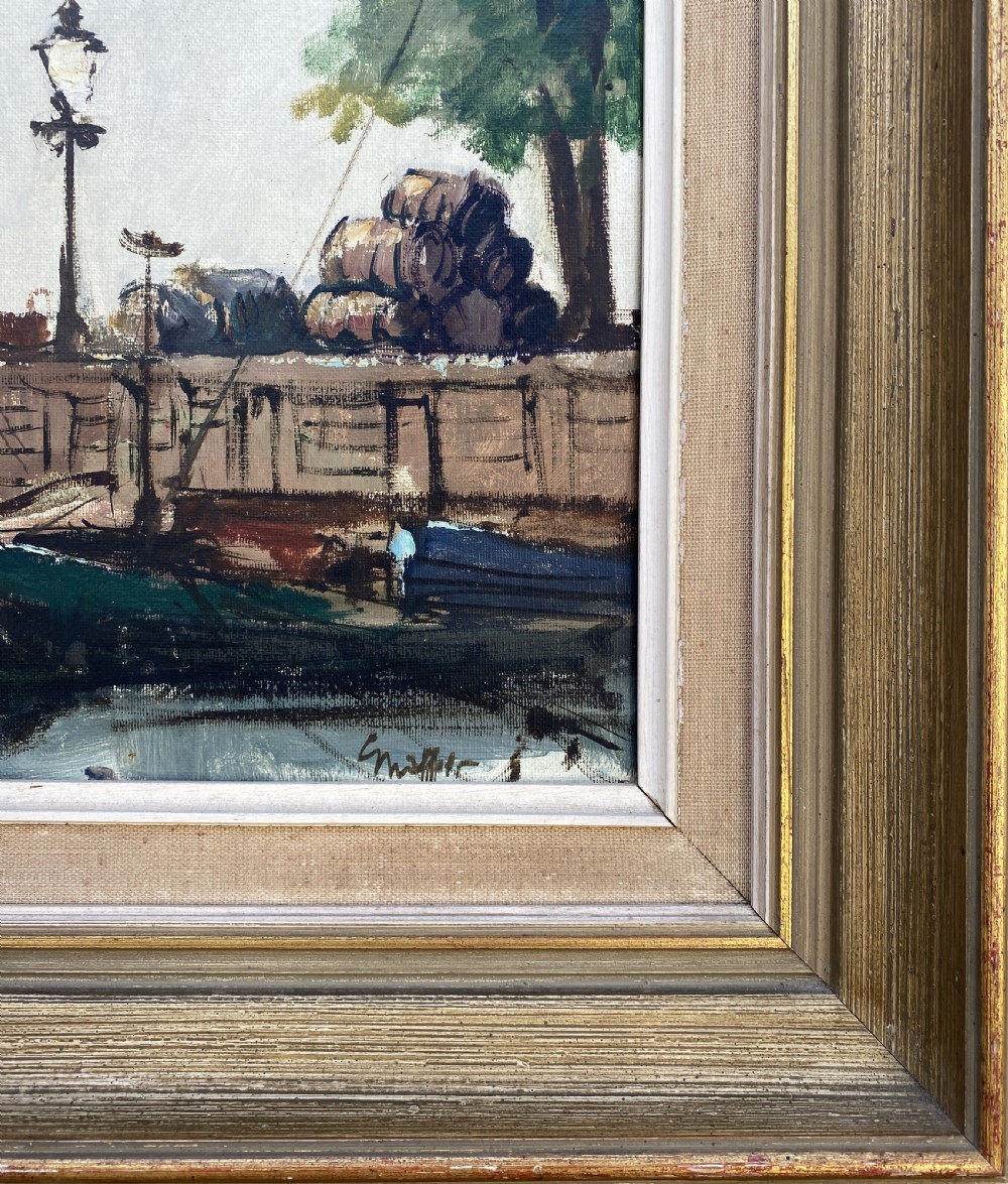 A framed Impressionist oil painting depicting moored boats in a calm harbour beside a tall masonry tower under a pale blue sky. View IX