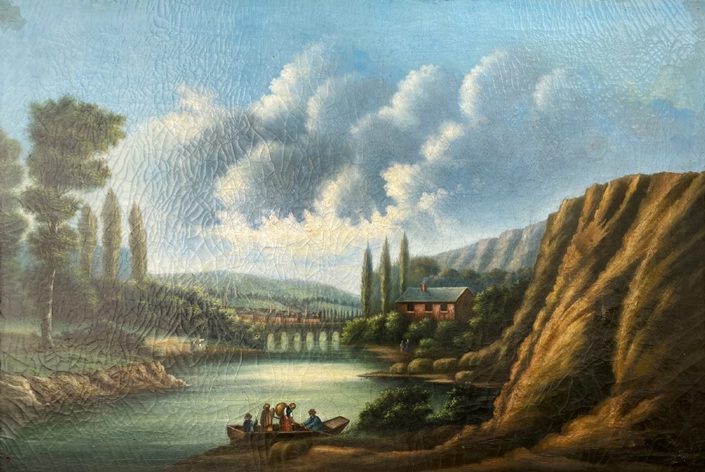 A 19th-century Italian School oil painting depicting a lakeside landscape with figures in a boat, towering cliffs, and a clouded blue sky inside a gilt frame. View II