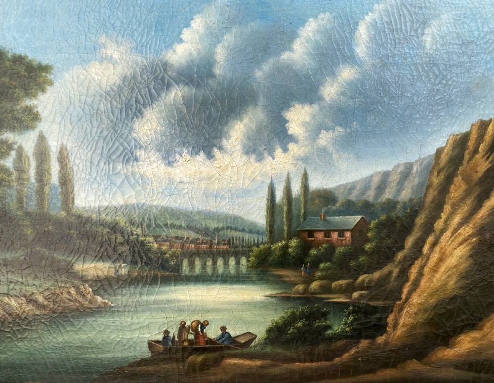 A 19th-century Italian School oil painting depicting a lakeside landscape with figures in a boat, towering cliffs, and a clouded blue sky inside a gilt frame. View III