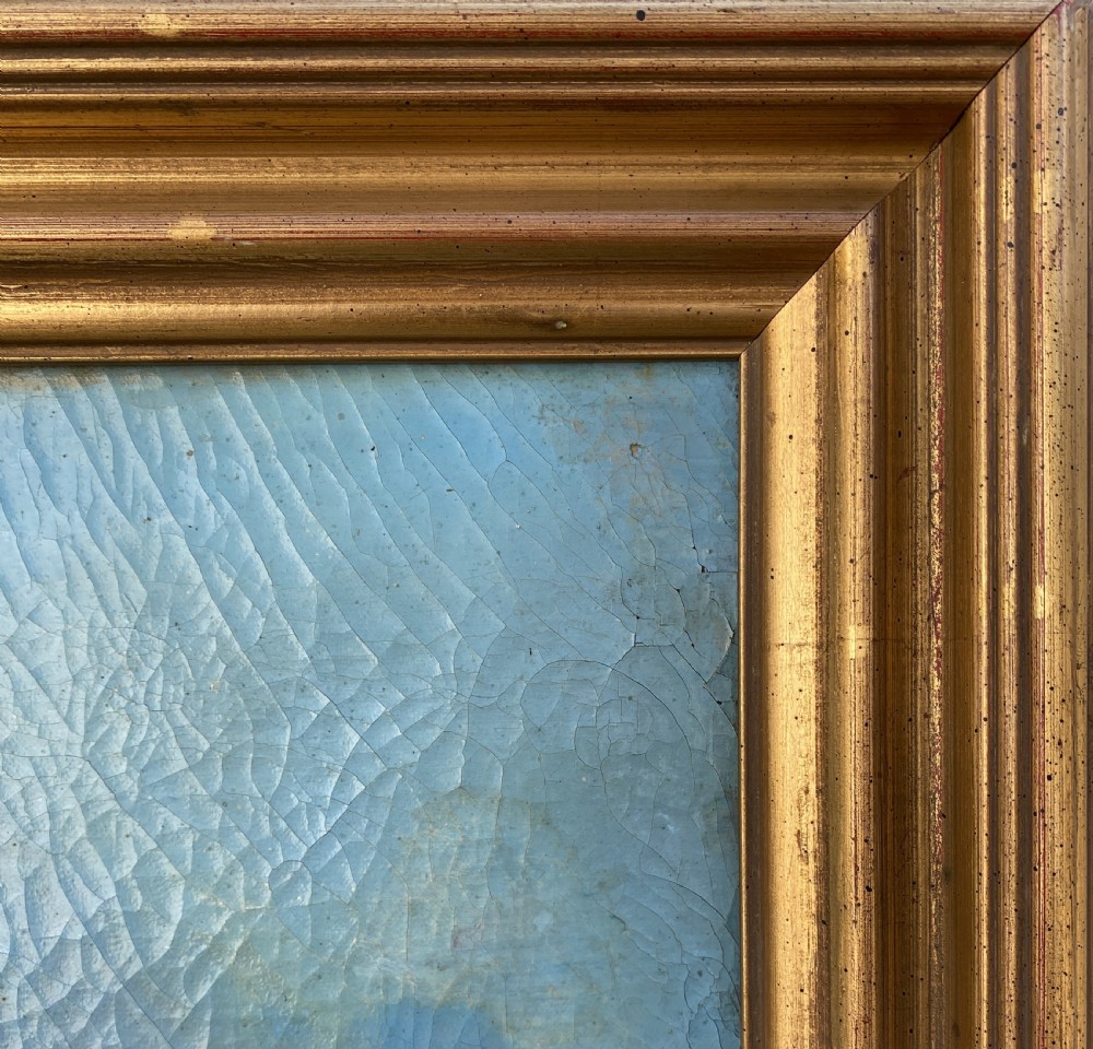 A 19th-century Italian School oil painting depicting a lakeside landscape with figures in a boat, towering cliffs, and a clouded blue sky inside a gilt frame. View XIII