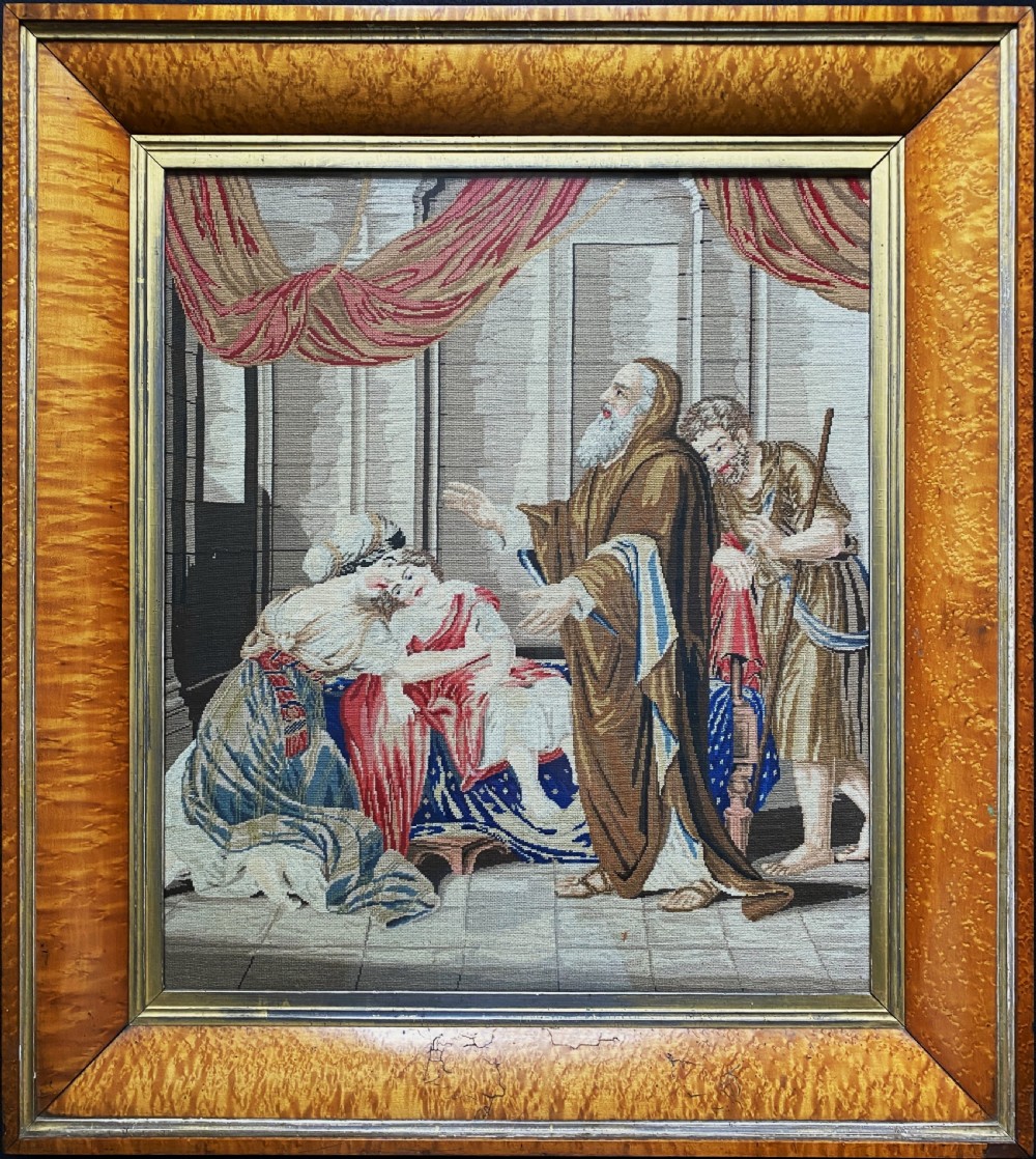 An antique Biedermeier picture frame crafted from birds eye maple veneer with an inner gilt slip enclosing a needlework tapestry. View XIII