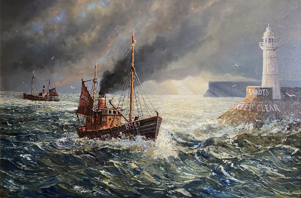 A framed oil painting depicting fishing trawlers navigating choppy sea waters near a lighthouse breakwater under a stormy sky. View II
