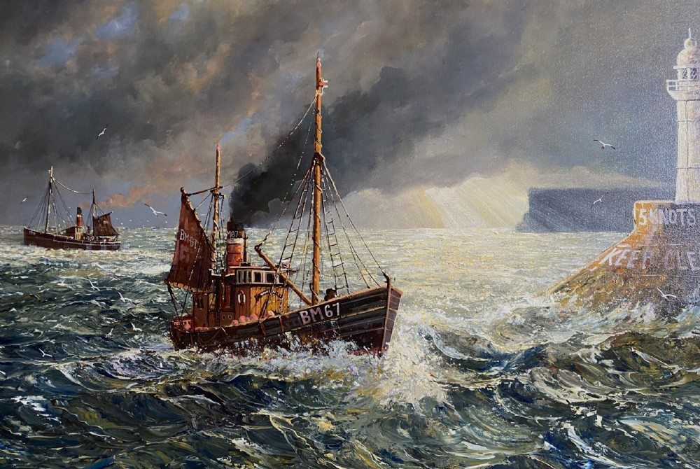 A framed oil painting depicting fishing trawlers navigating choppy sea waters near a lighthouse breakwater under a stormy sky. View III