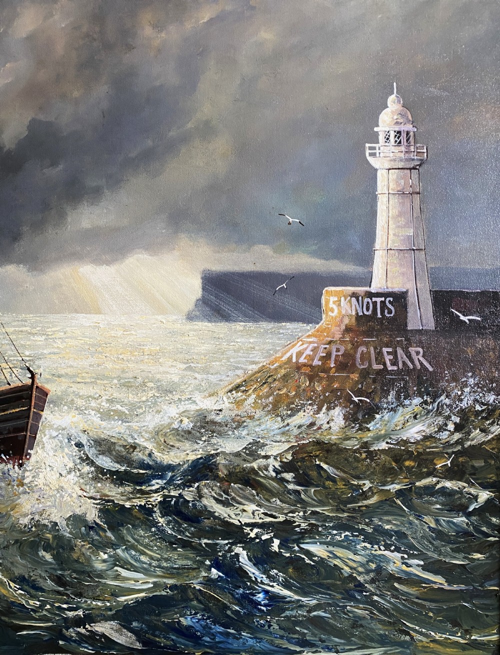 A framed oil painting depicting fishing trawlers navigating choppy sea waters near a lighthouse breakwater under a stormy sky. View IV