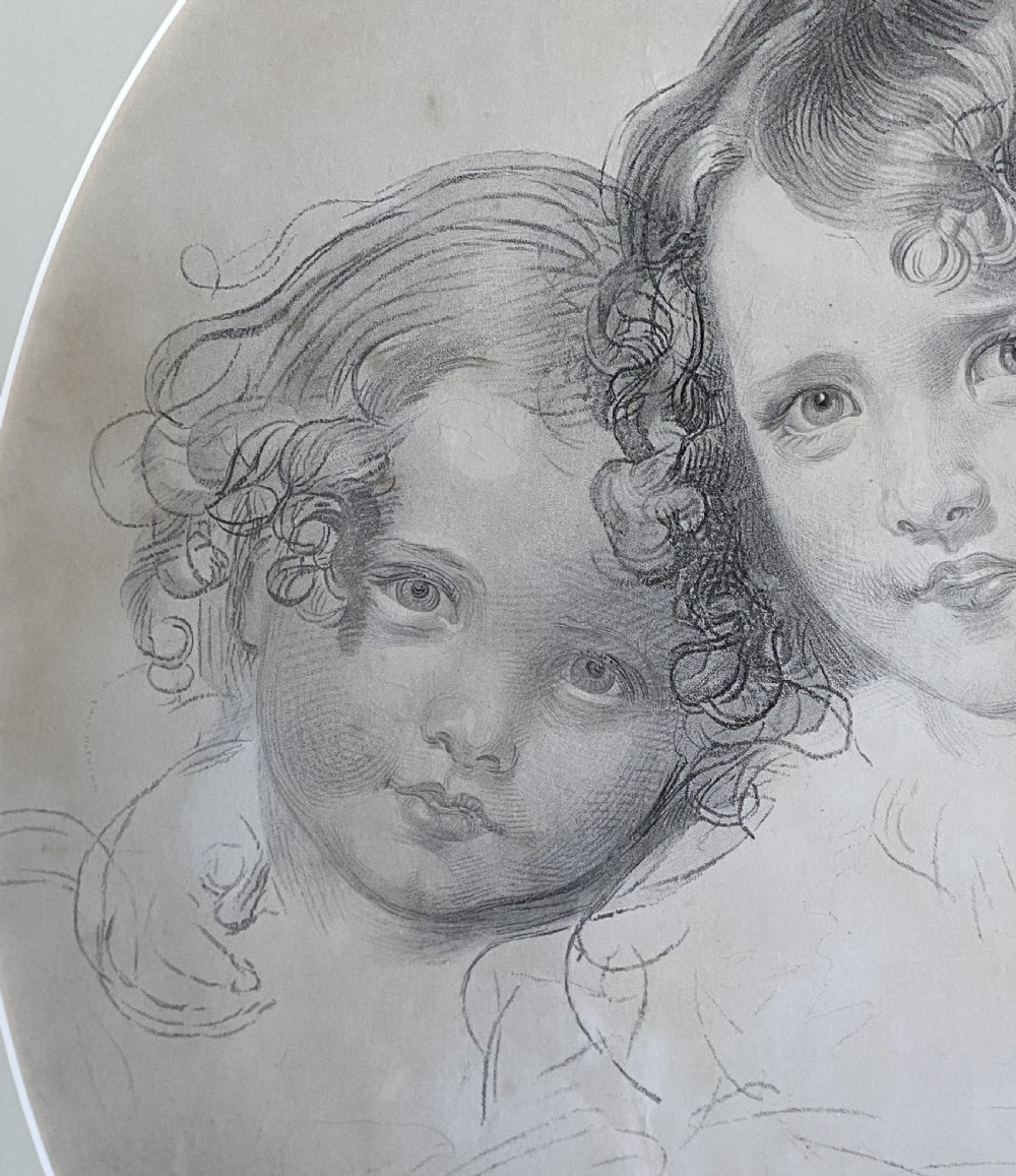 A 19th-century monochrome engraving depicting two young children set within an oval paper mount inside a moulded gold gilt frame. View VII