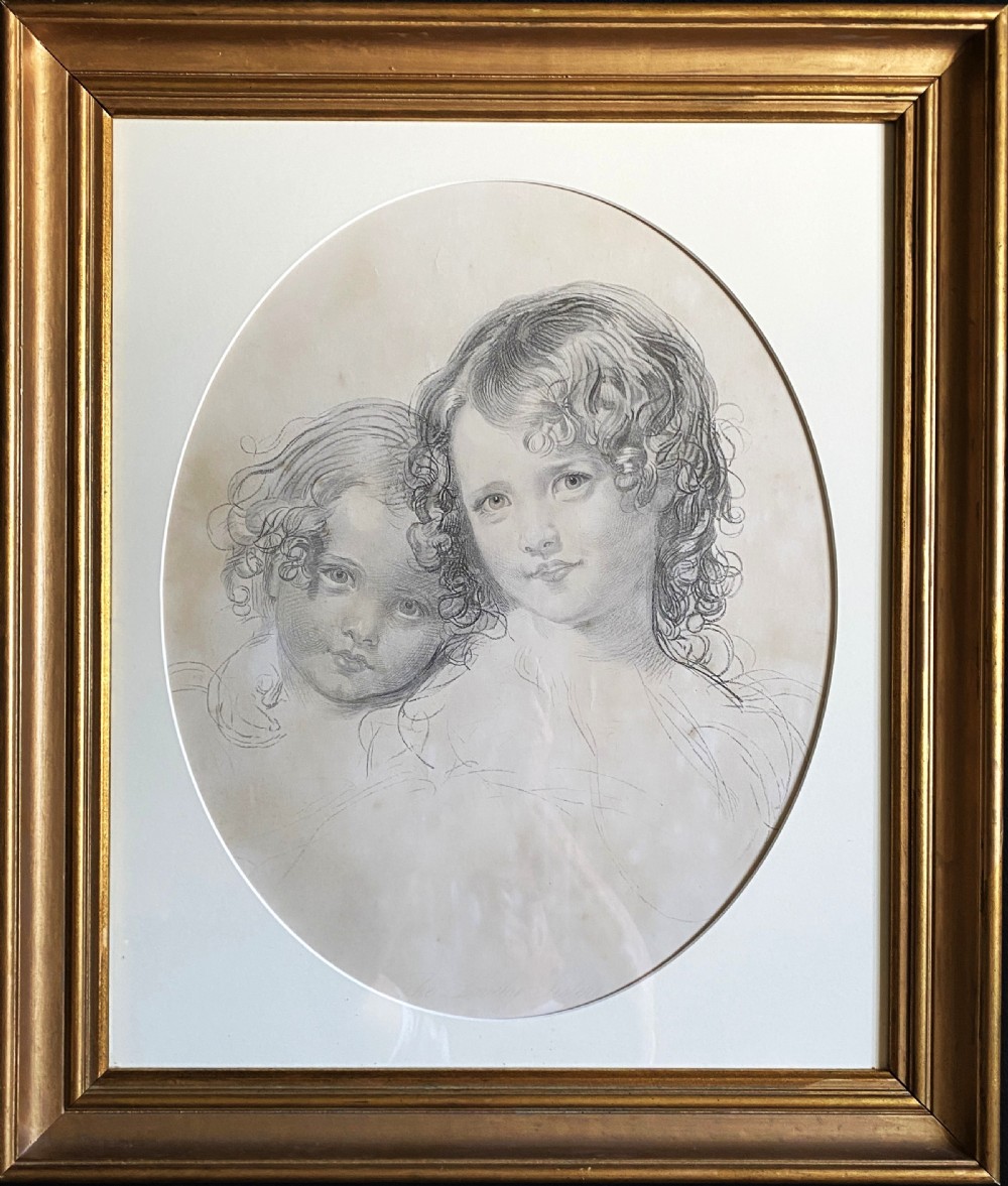 A 19th-century monochrome engraving depicting two young children set within an oval paper mount inside a moulded gold gilt frame. View XIV