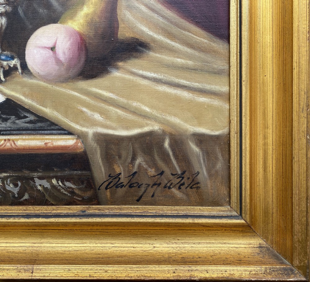 A framed oil painting on canvas depicting a table with fruit, lilacs in a central vase, silver ewers, and draped gold and burgundy fabrics. View IX