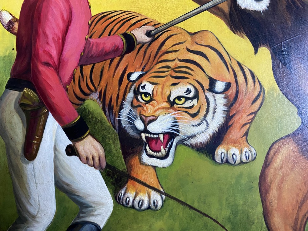 A framed mid-twentieth-century oil painting depicting a lion tamer confronting a roaring lion and a tiger against a yellow background with bold red circus lettering. View X