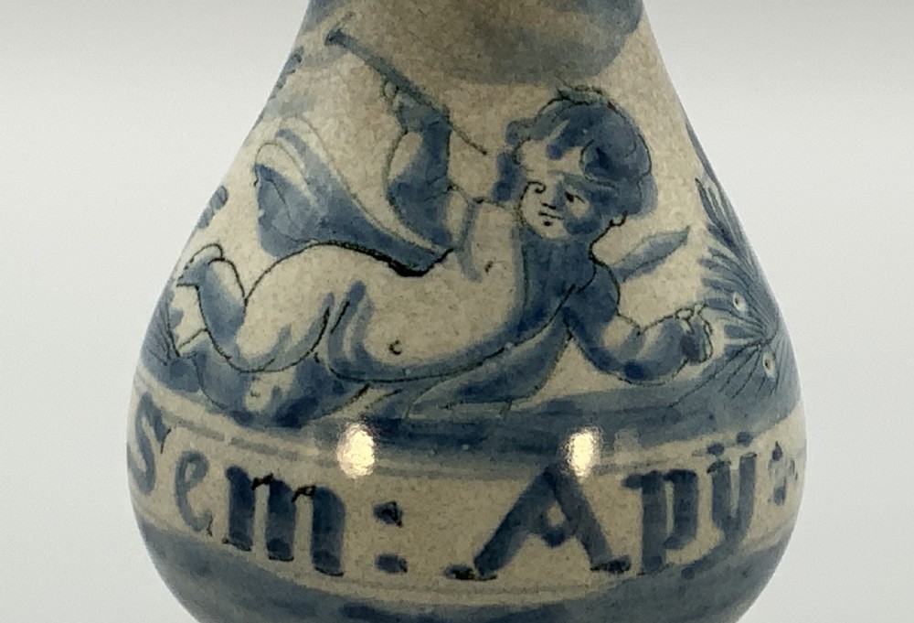 Pair of 17th-century Italian Savona majolica apothecary bottles with cobalt blue hand-painted putti and Latin inscriptions over a tin-glazed ground. View V