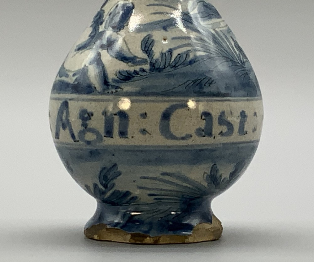 Pair of 17th-century Italian Savona majolica apothecary bottles with cobalt blue hand-painted putti and Latin inscriptions over a tin-glazed ground. View XIV