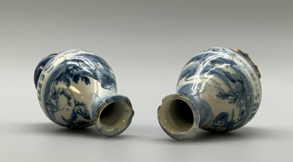 Pair of 17th-century Italian Savona majolica apothecary bottles with cobalt blue hand-painted putti and Latin inscriptions over a tin-glazed ground. View XV