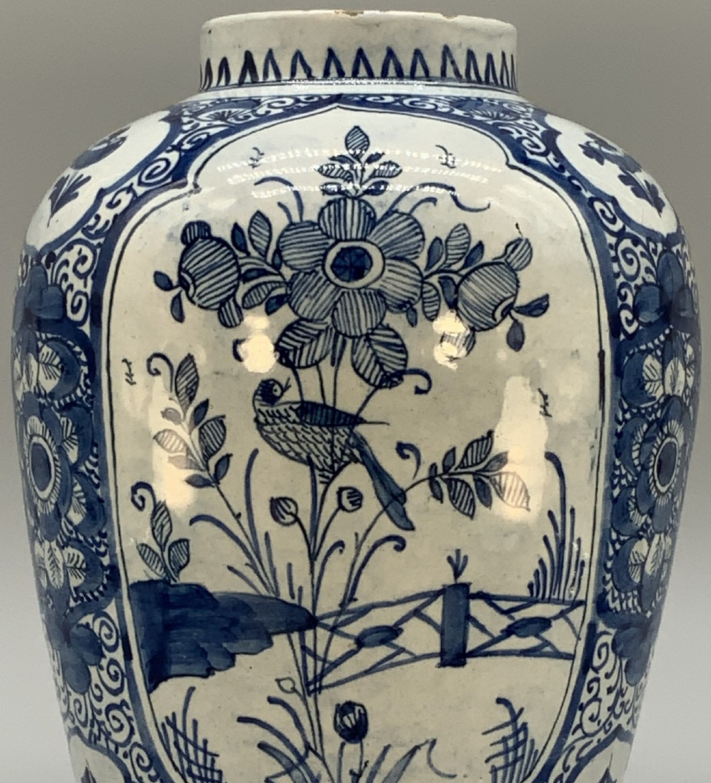 A 17th-century Dutch Delftware vase hand-painted in cobalt blue and white with chinoiserie motifs depicting birds and flowers. View III