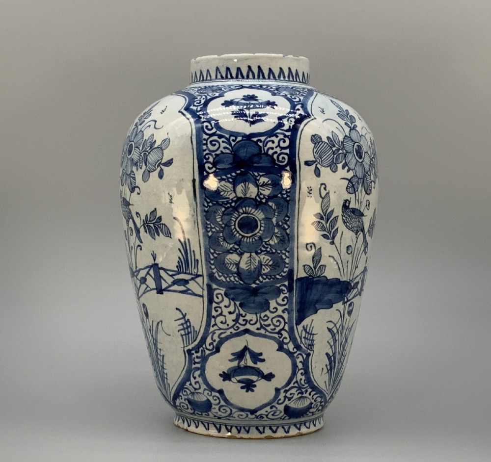 A 17th-century Dutch Delftware vase hand-painted in cobalt blue and white with chinoiserie motifs depicting birds and flowers. View V