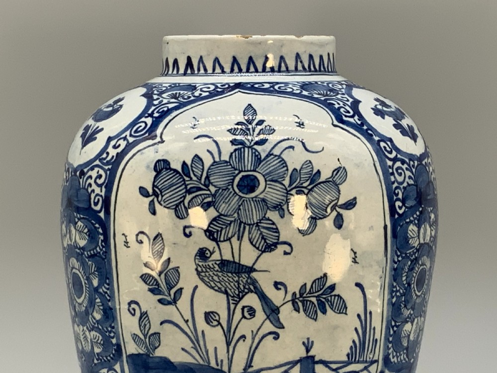 A 17th-century Dutch Delftware vase hand-painted in cobalt blue and white with chinoiserie motifs depicting birds and flowers. View XI