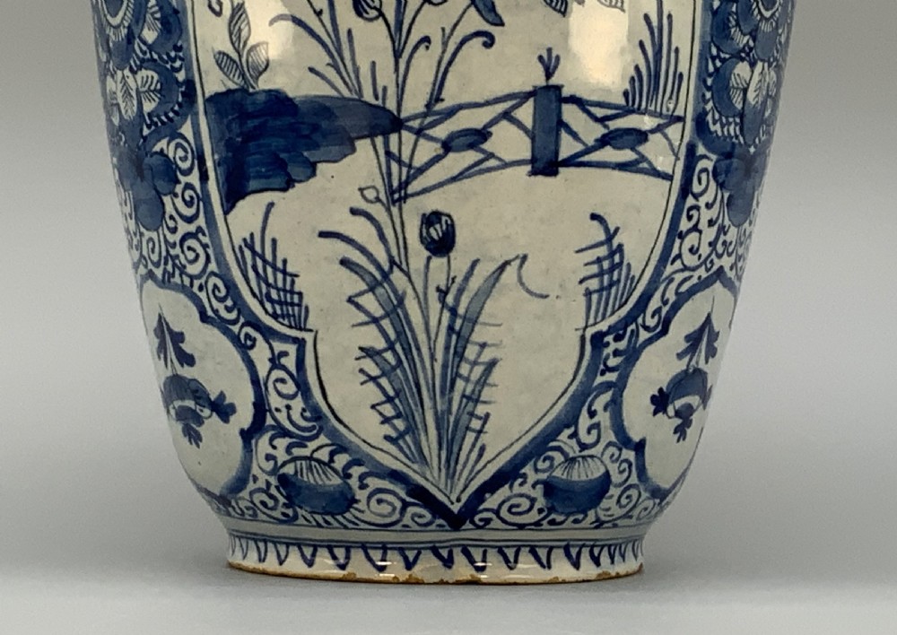 A 17th-century Dutch Delftware vase hand-painted in cobalt blue and white with chinoiserie motifs depicting birds and flowers. View XIII