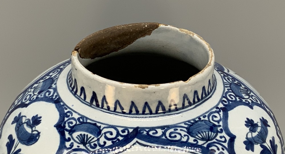 A 17th-century Dutch Delftware vase hand-painted in cobalt blue and white with chinoiserie motifs depicting birds and flowers. View XIV