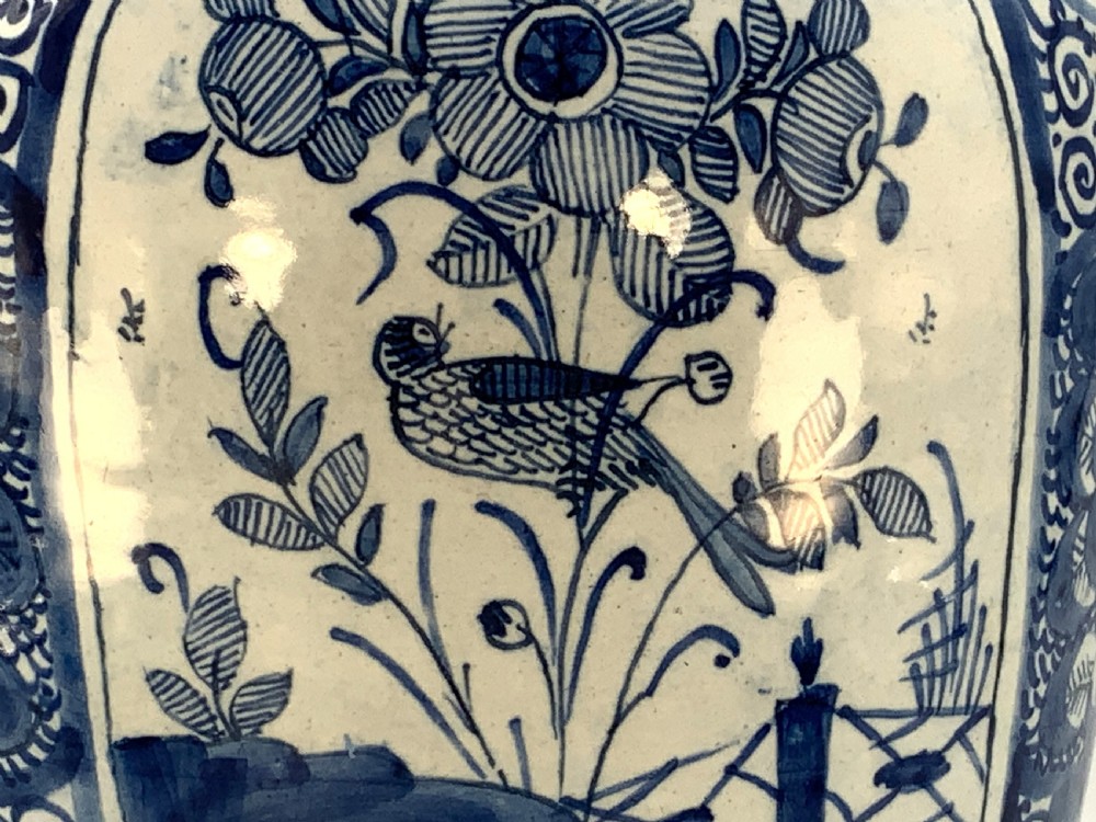 A 17th-century Dutch Delftware vase hand-painted in cobalt blue and white with chinoiserie motifs depicting birds and flowers. View XVI