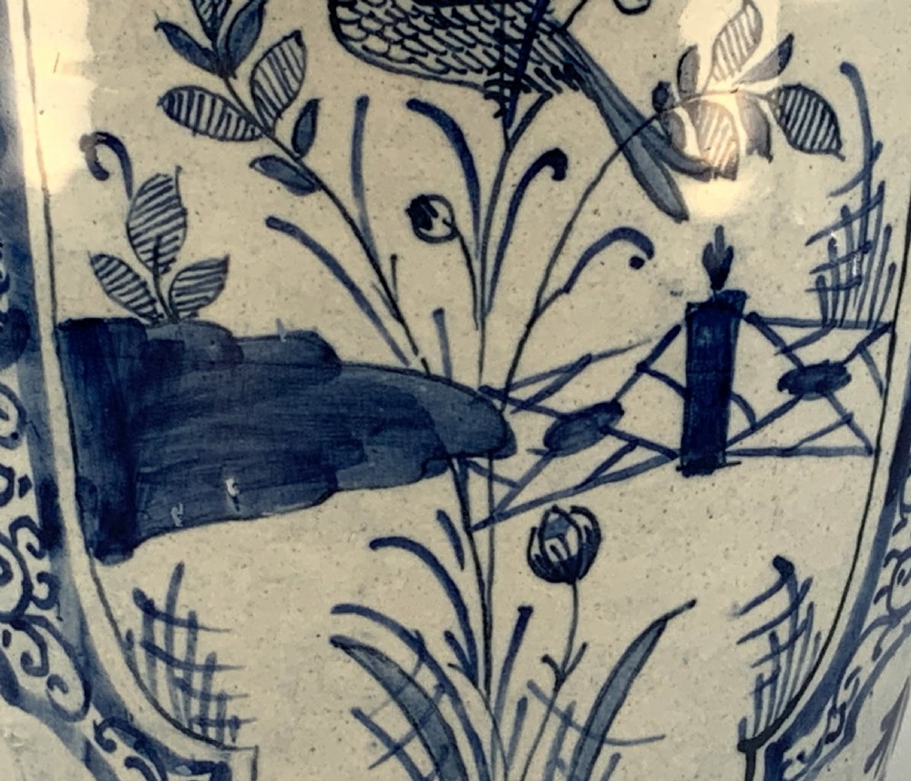 A 17th-century Dutch Delftware vase hand-painted in cobalt blue and white with chinoiserie motifs depicting birds and flowers. View XVII