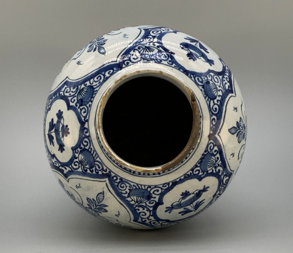 A 17th-century Dutch Delftware vase hand-painted in cobalt blue and white with chinoiserie motifs depicting birds and flowers. View XXI