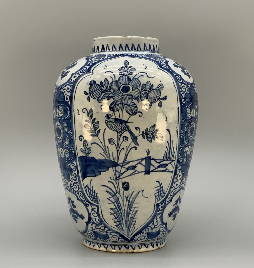 A 17th-century Dutch Delftware vase hand-painted in cobalt blue and white with chinoiserie motifs depicting birds and flowers. View XXII