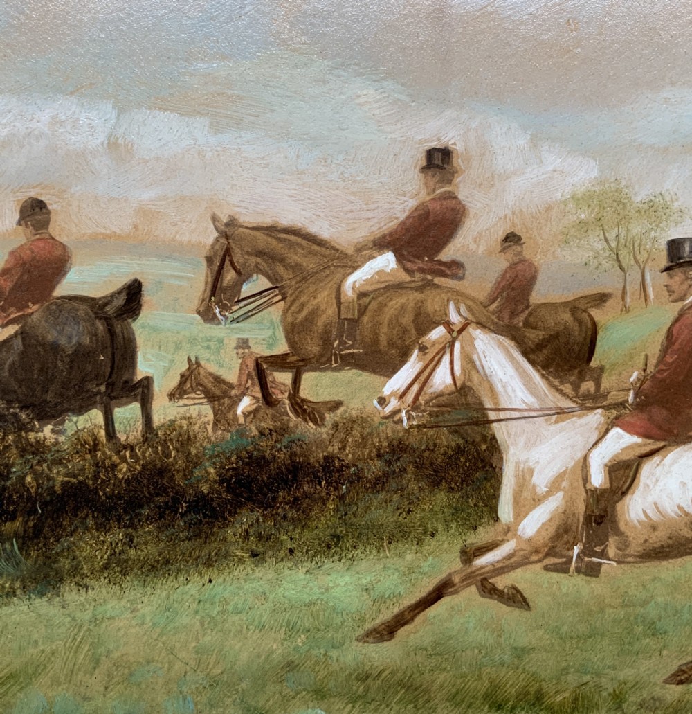 An oil painting on board depicting horseback riders navigating a grassy field, housed in a decorative gilded frame. View VII