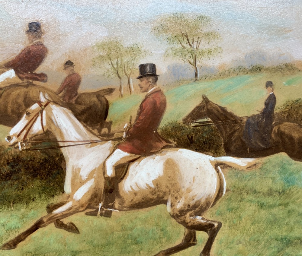 An oil painting on board depicting horseback riders navigating a grassy field, housed in a decorative gilded frame. View IX