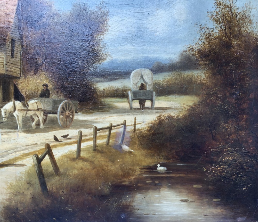 A 19th-century oil painting depicting a rural English village with horses, figures, and cottages on a dirt road, set in a carved gilded frame. View IX
