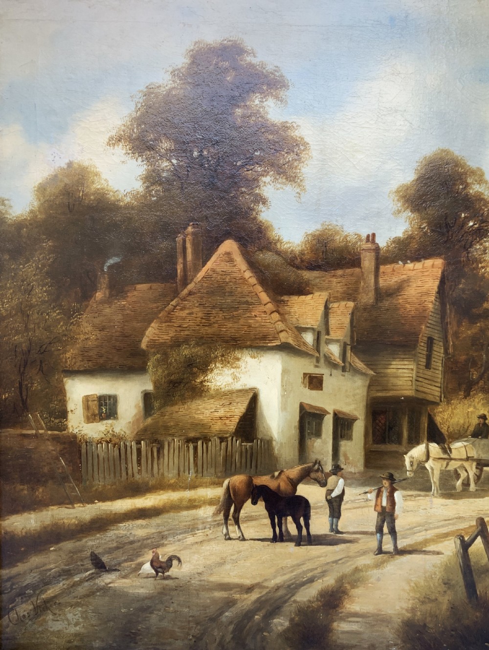 A 19th-century oil painting depicting a rural English village with horses, figures, and cottages on a dirt road, set in a carved gilded frame. View XI