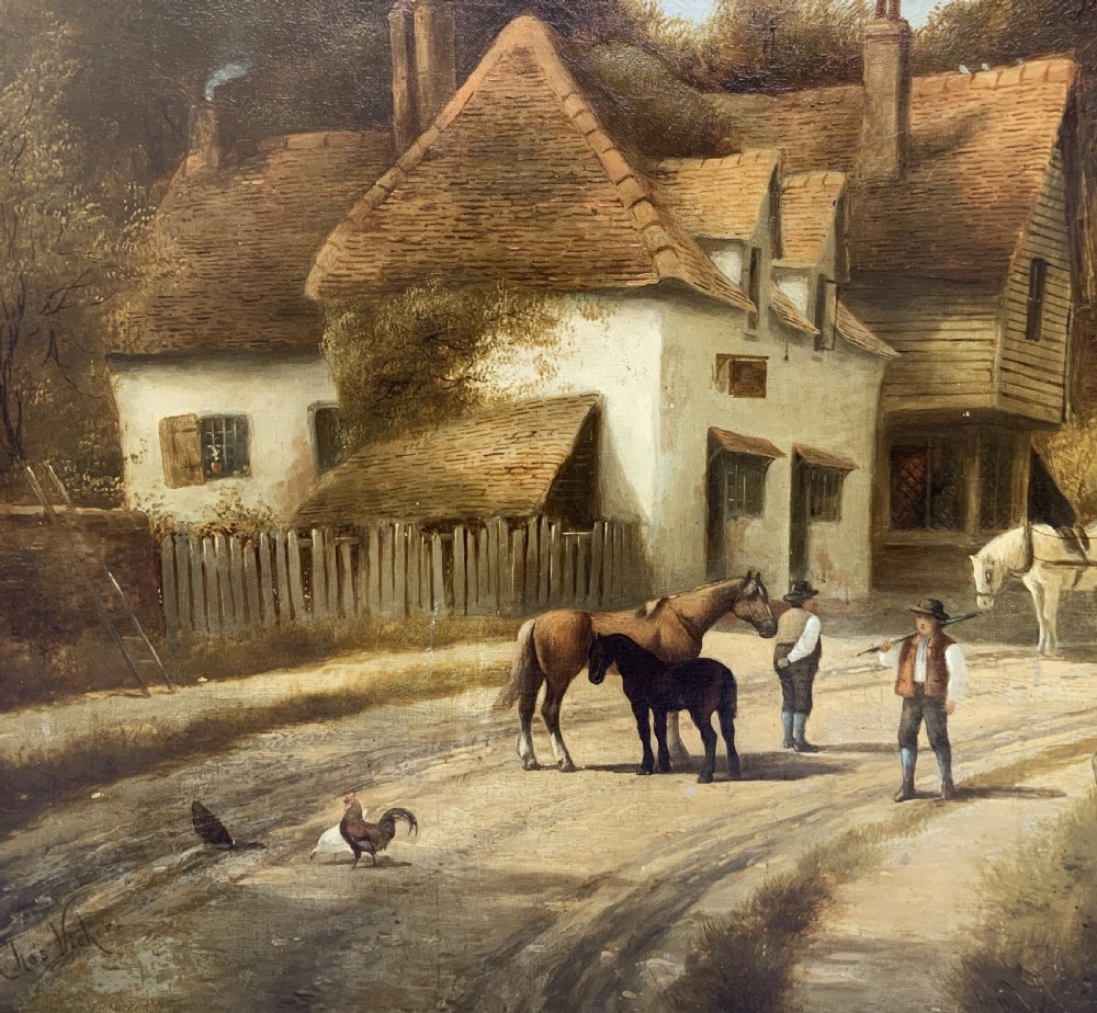 A 19th-century oil painting depicting a rural English village with horses, figures, and cottages on a dirt road, set in a carved gilded frame. View XII