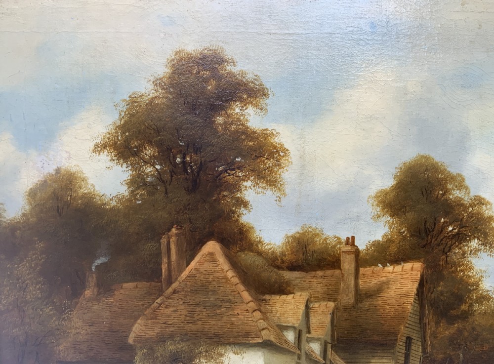 A 19th-century oil painting depicting a rural English village with horses, figures, and cottages on a dirt road, set in a carved gilded frame. View XIV