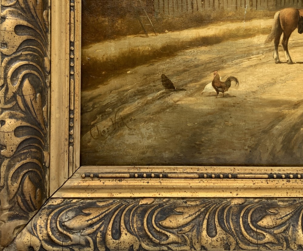 A 19th-century oil painting depicting a rural English village with horses, figures, and cottages on a dirt road, set in a carved gilded frame. View XVII
