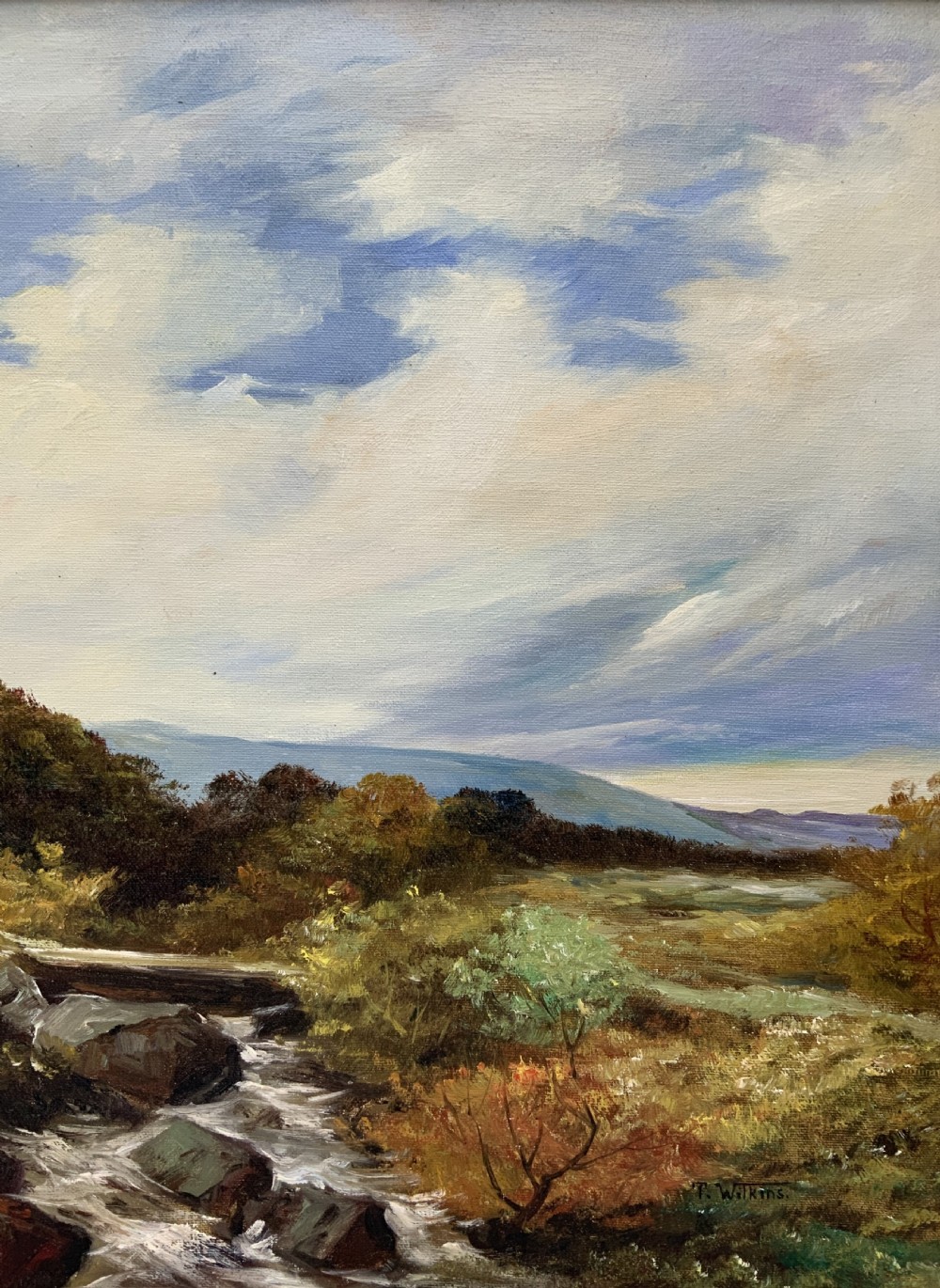 An oil painting on canvas depicting an autumnal countryside landscape with a running stream, trees, distant hills, and a gilded ornate wooden frame with a fabric slip. View IV