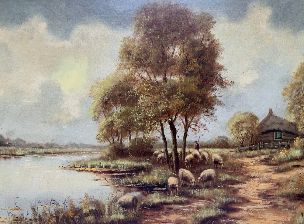 A framed oil painting on canvas depicting a rural autumn landscape with sheep grazing along a riverbank near a cottage under a cloudy sky. View III