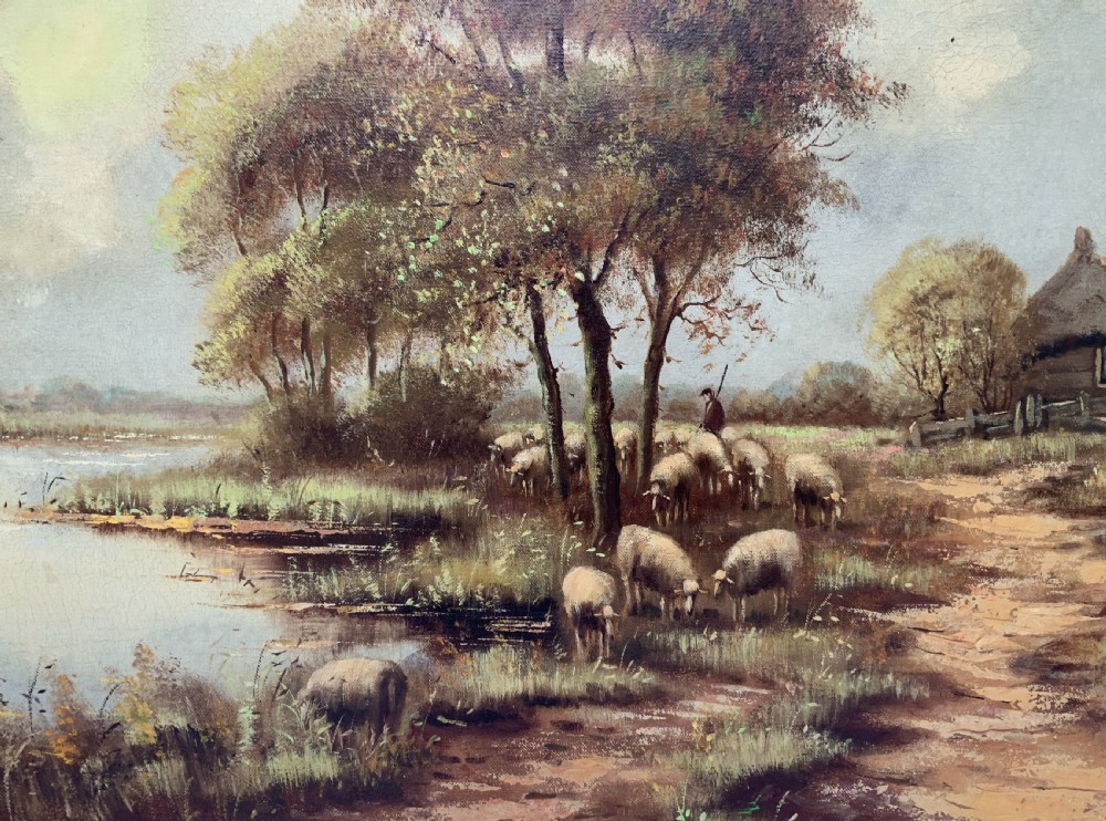 A framed oil painting on canvas depicting a rural autumn landscape with sheep grazing along a riverbank near a cottage under a cloudy sky. View VII