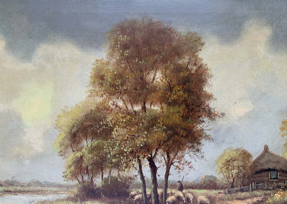 A framed oil painting on canvas depicting a rural autumn landscape with sheep grazing along a riverbank near a cottage under a cloudy sky. View VIII