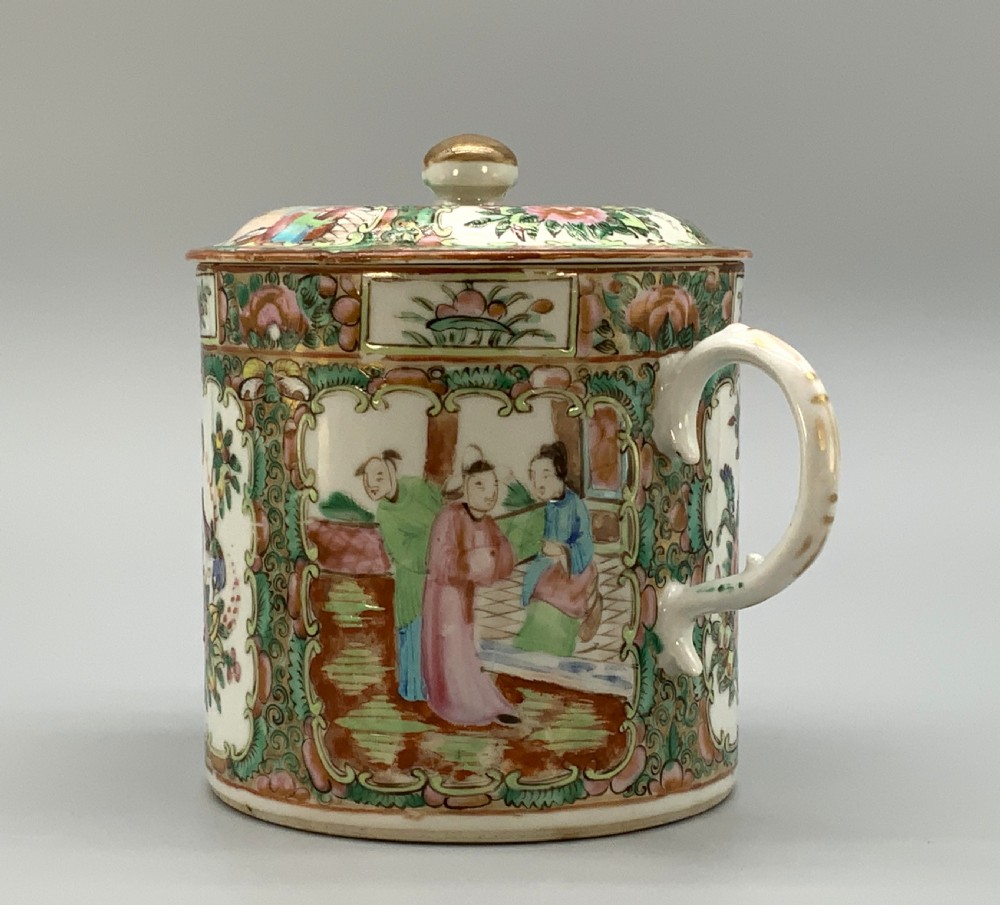 A 19th-century Chinese export porcelain barrel-form coffee pot with cover, decorated with famille rose enamel figural reserves and floral patterns. View IV