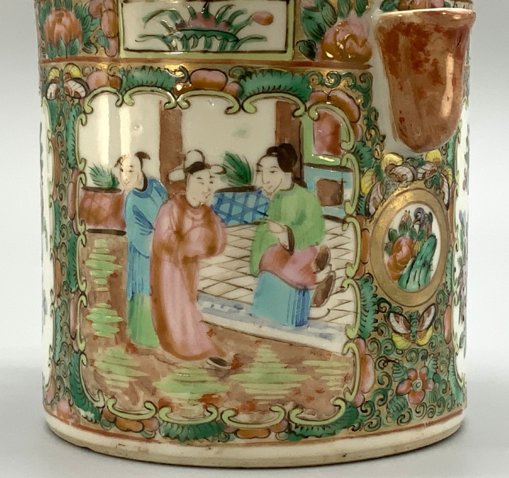 A 19th-century Chinese export porcelain barrel-form coffee pot with cover, decorated with famille rose enamel figural reserves and floral patterns. View X